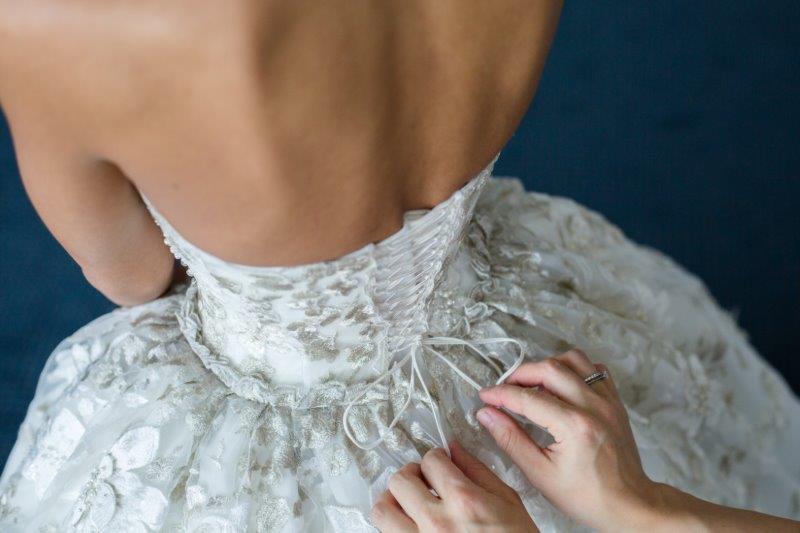 VERA: the laced back of a lace wedding bodice, closed by hand
